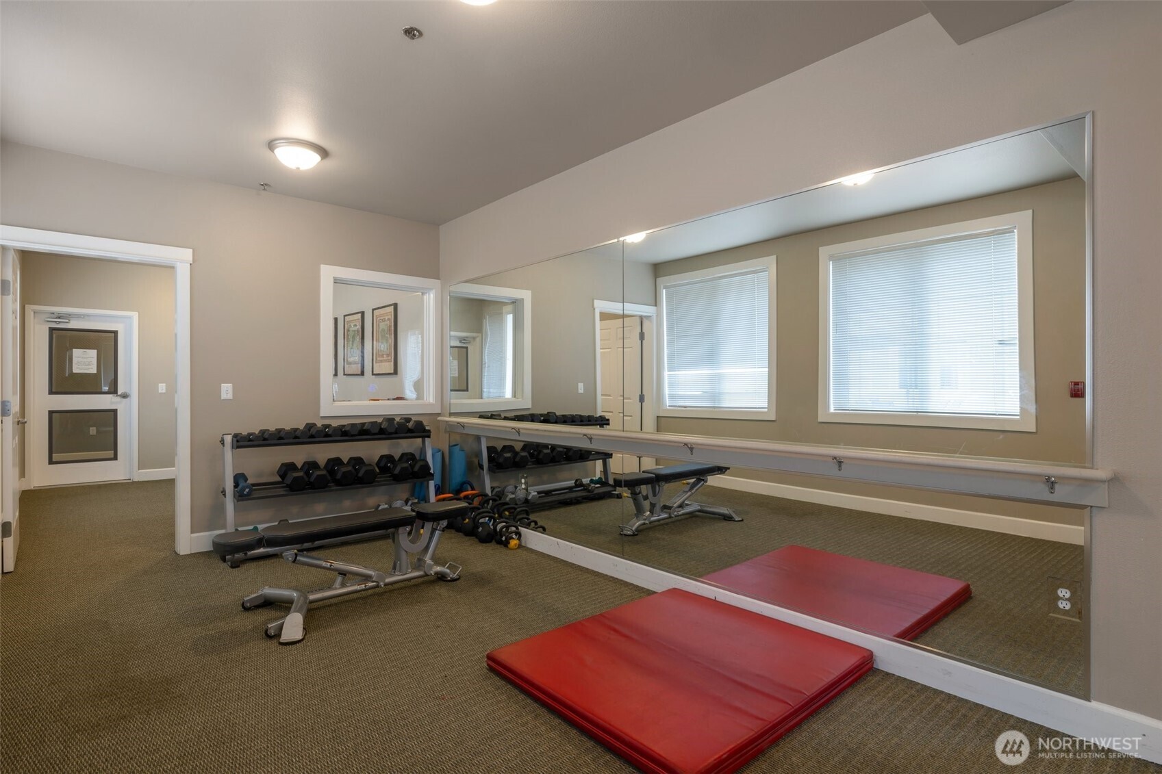 13301 Southeast 79th Place, Unit B402 Newcastle, WA 98059 - Photo 23 of 25 a living room with a table
