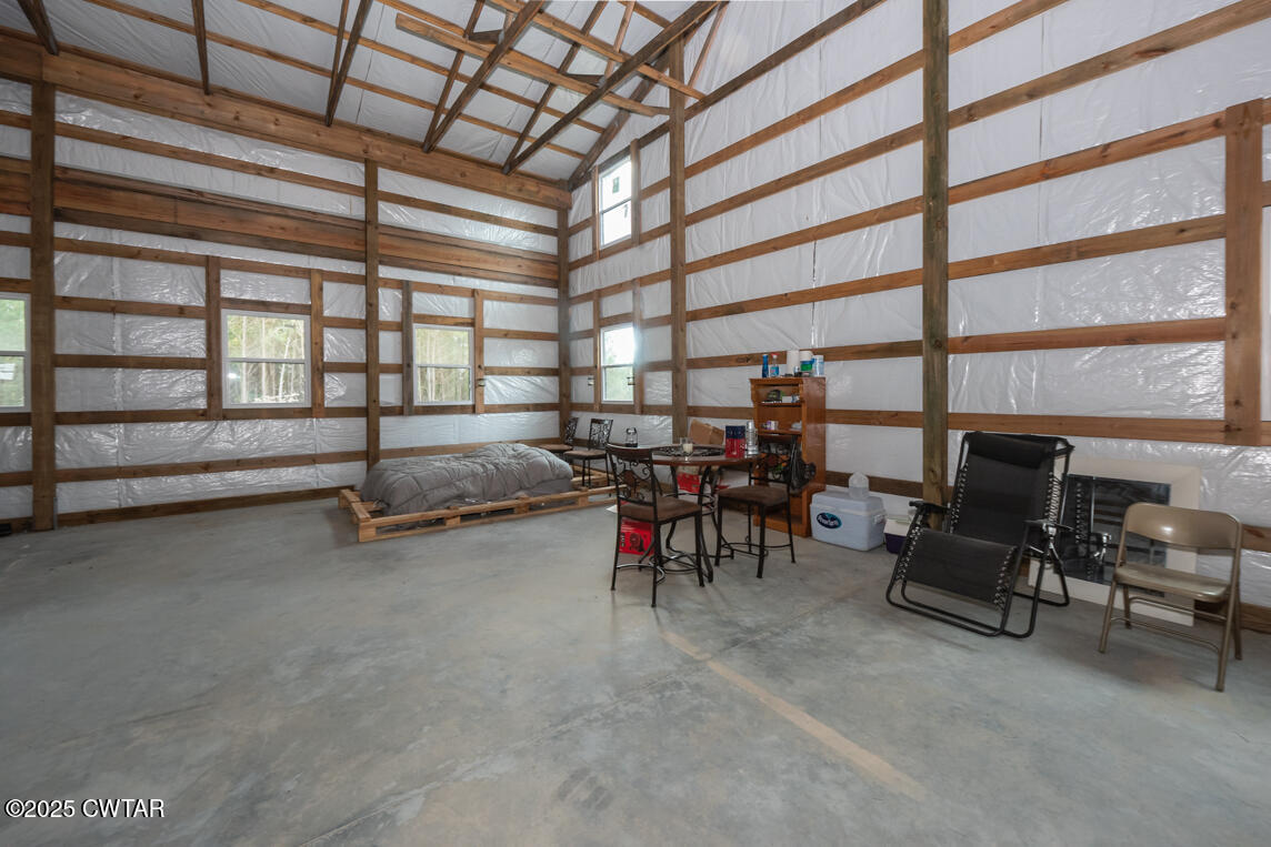 190 Pine Tree Drive Parsons, TN 38363 - Photo 14 of 56 a living room with furniture and a window