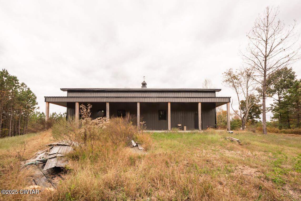 190 Pine Tree Drive Parsons, TN 38363 - Photo 30 of 56 a view of a house with a yard