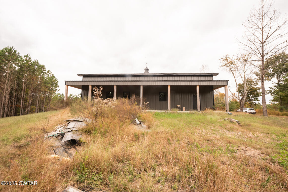 190 Pine Tree Drive Parsons, TN 38363 - Photo 32 of 56 a house view with a garden space