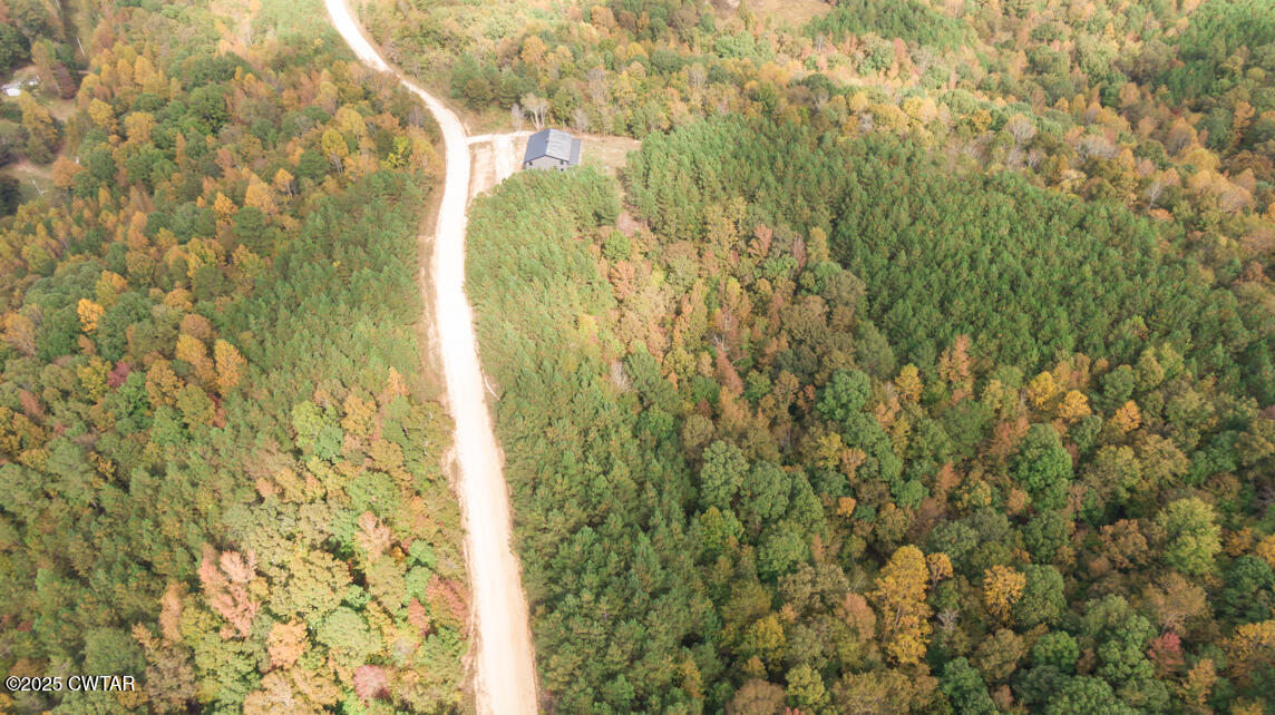 190 Pine Tree Drive Parsons, TN 38363 - Photo 48 of 56 a bathroom with a small window