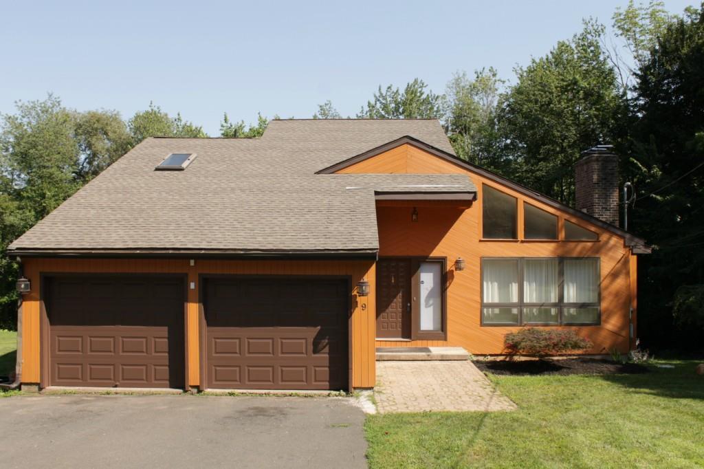 19 Burr Road Bloomfield, CT 06002 - Photo 1 of 1 a front view of a house with a yard