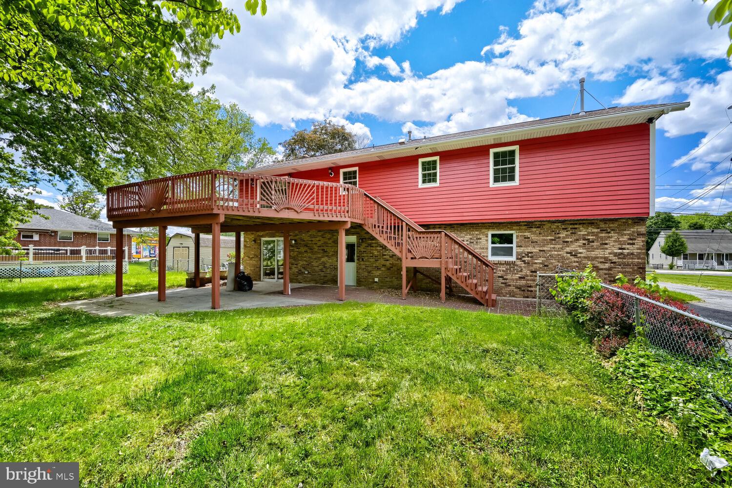 719 South Marlyn Avenue Baltimore, MD 21221 - Photo 11 of 39 a view of a house with a yard porch and sitting area