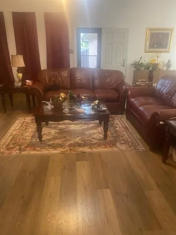 a living room with furniture and a couch