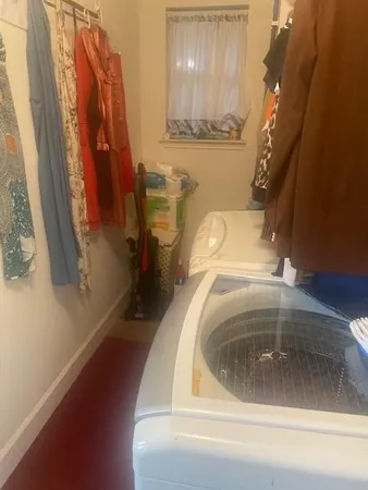 a utility room with a washer and dryer