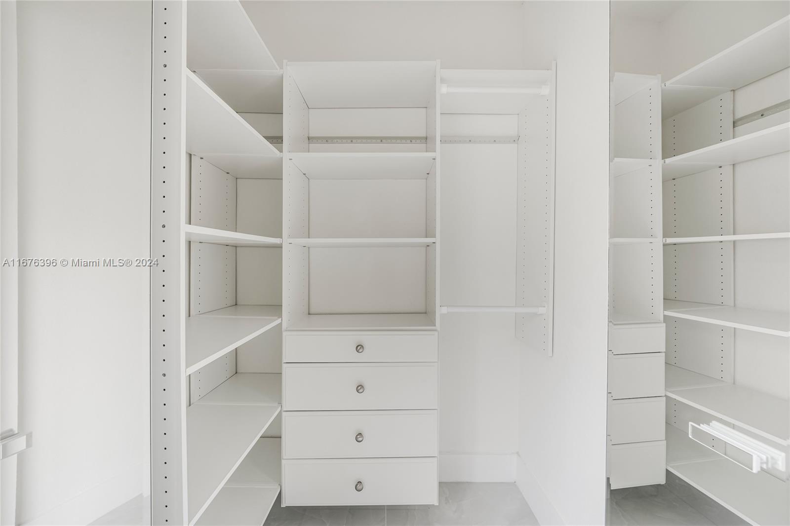1740 Northwest 53rd Street Miami, FL 33142 - Photo 11 of 25 a view of an empty walk in closet