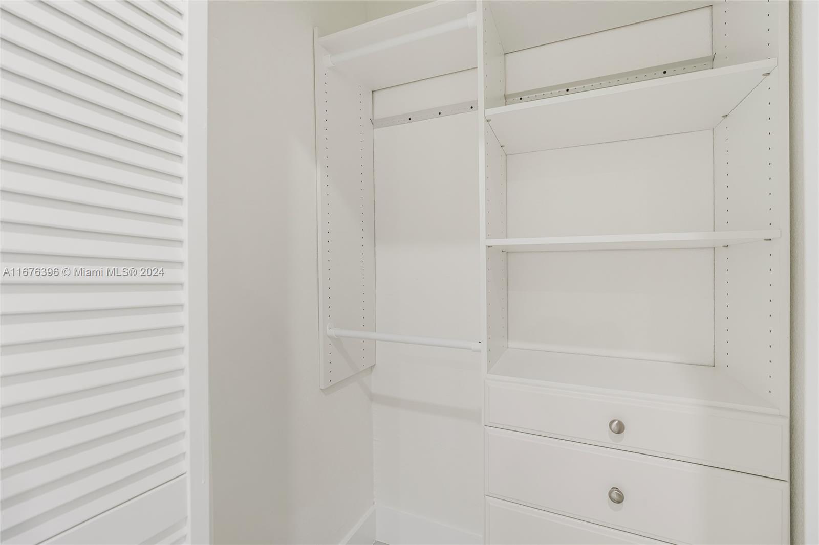 1740 Northwest 53rd Street Miami, FL 33142 - Photo 17 of 25 a view of walk in closet