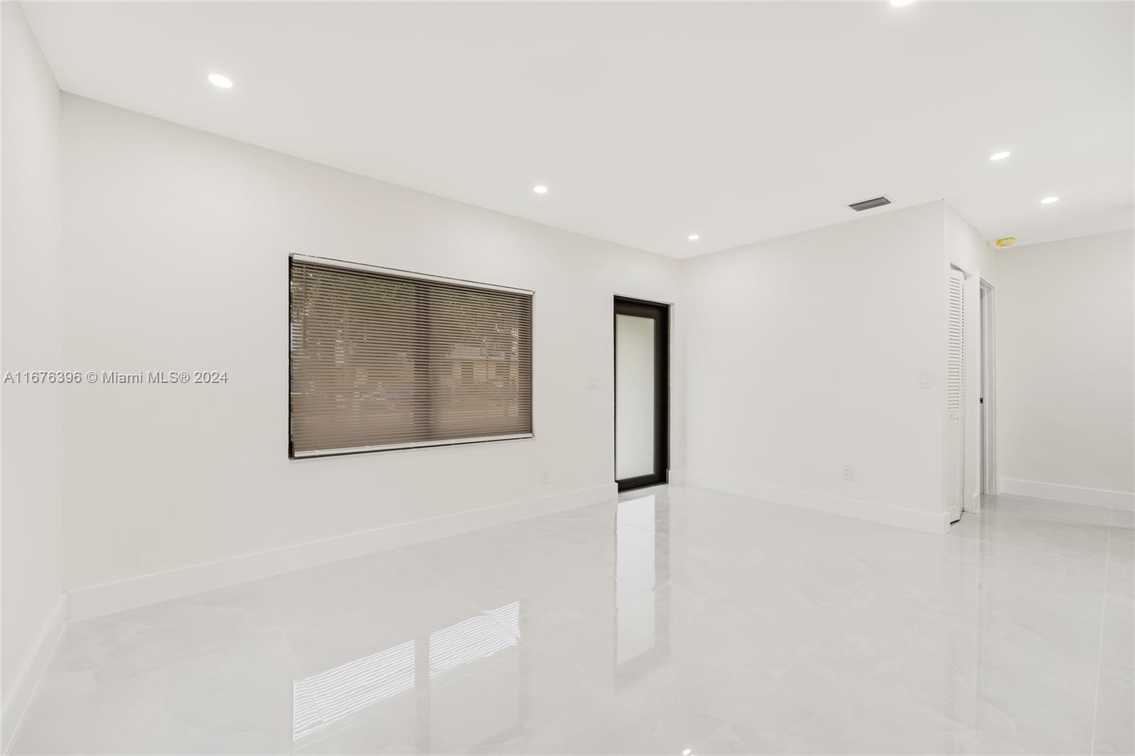 1740 Northwest 53rd Street Miami, FL 33142 - Photo 18 of 25 a view of an empty room
