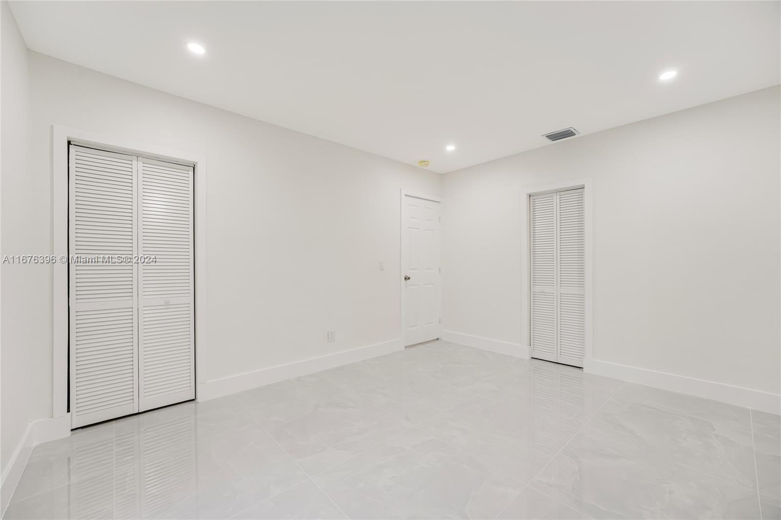 1740 Northwest 53rd Street Miami, FL 33142 - Photo 21 of 25 a view of an empty room