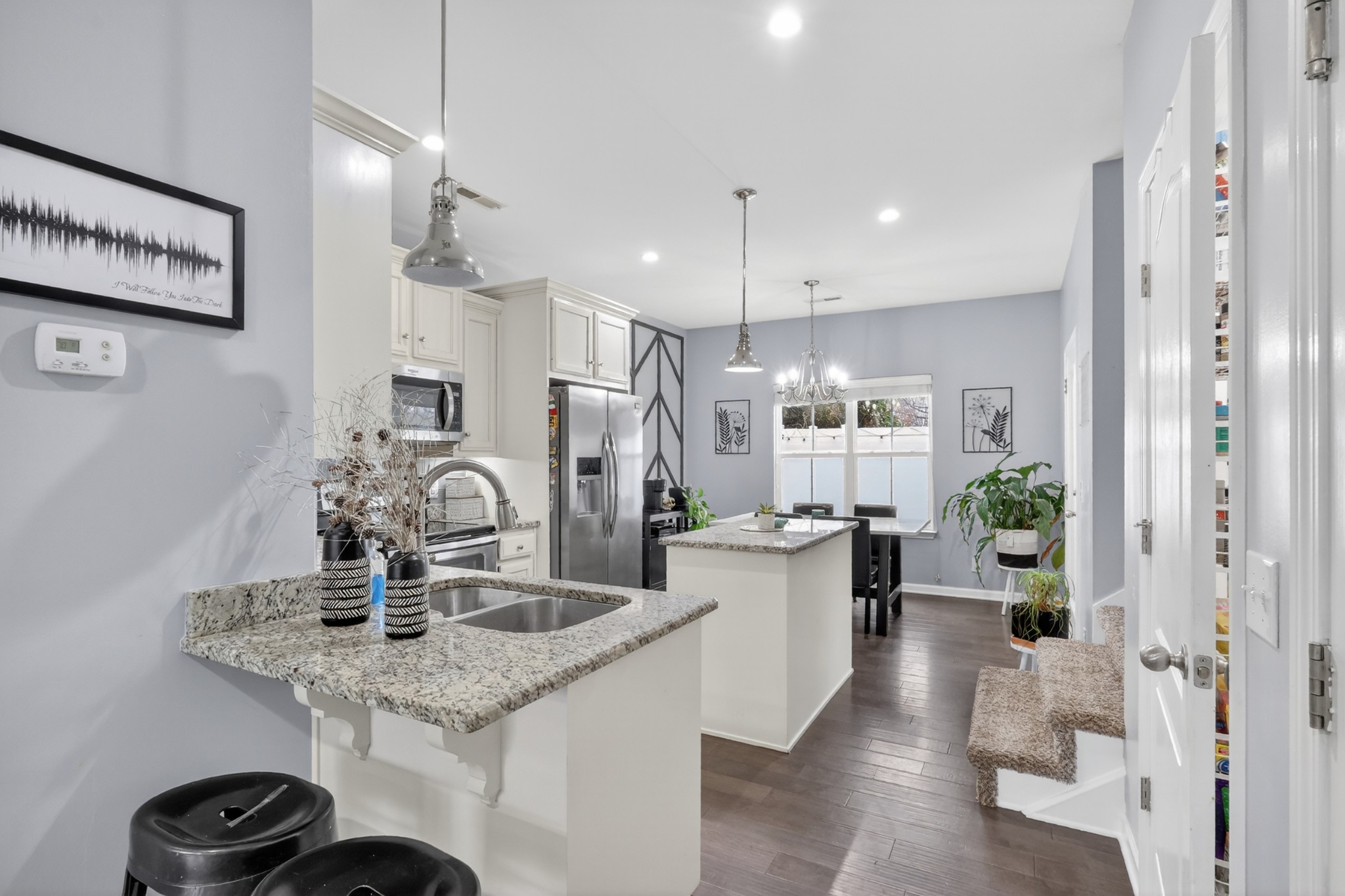 706 Indian Ridge Circle White House, TN 37188 - Photo 12 of 42 a kitchen with sink refrigerator and cabinets