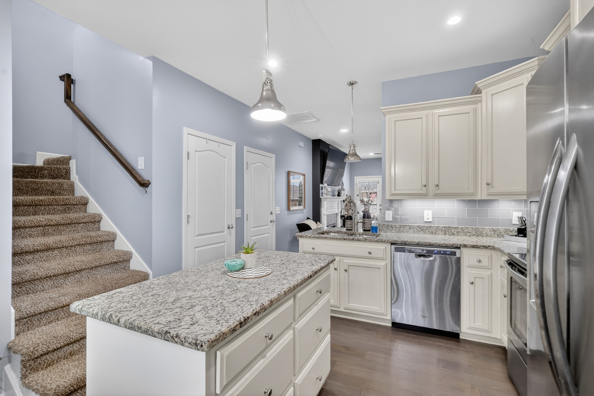 706 Indian Ridge Circle White House, TN 37188 - Photo 15 of 42 a kitchen with stainless steel appliances granite countertop a sink stove and refrigerator