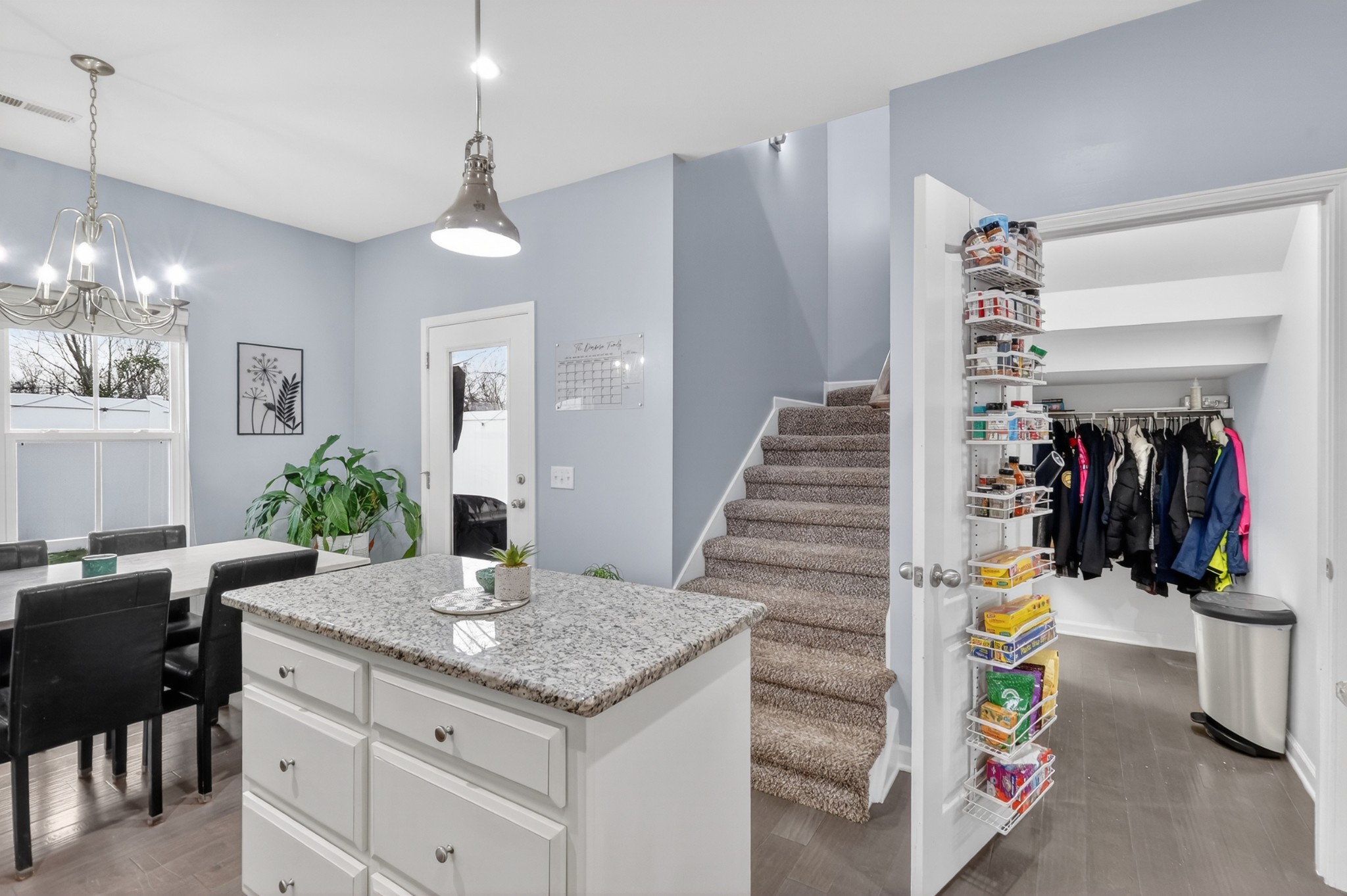 706 Indian Ridge Circle White House, TN 37188 - Photo 17 of 42 a view of a dining room with furniture and a chandelier