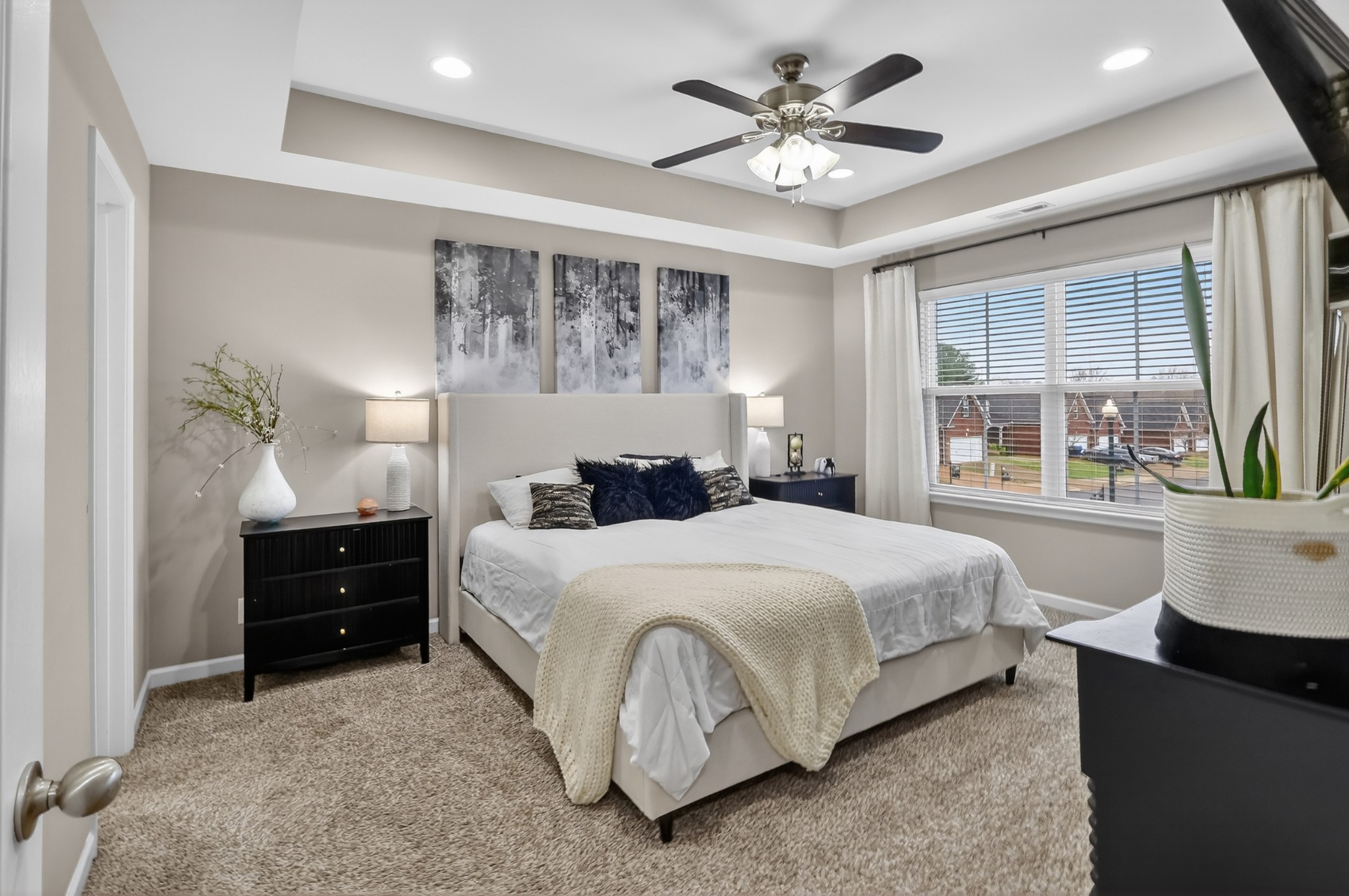 706 Indian Ridge Circle White House, TN 37188 - Photo 21 of 42 a bedroom with a large bed and a large window