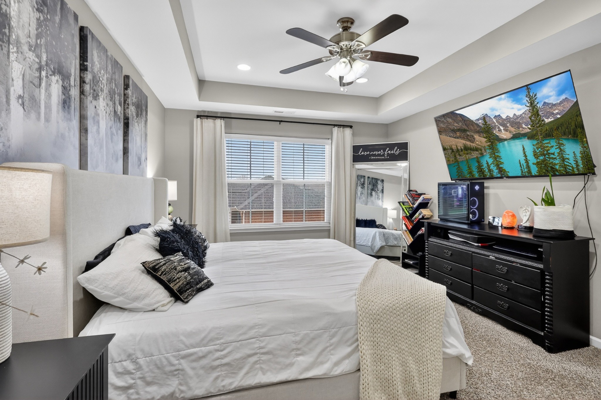 706 Indian Ridge Circle White House, TN 37188 - Photo 22 of 42 a bed room with bed and a flat screen tv
