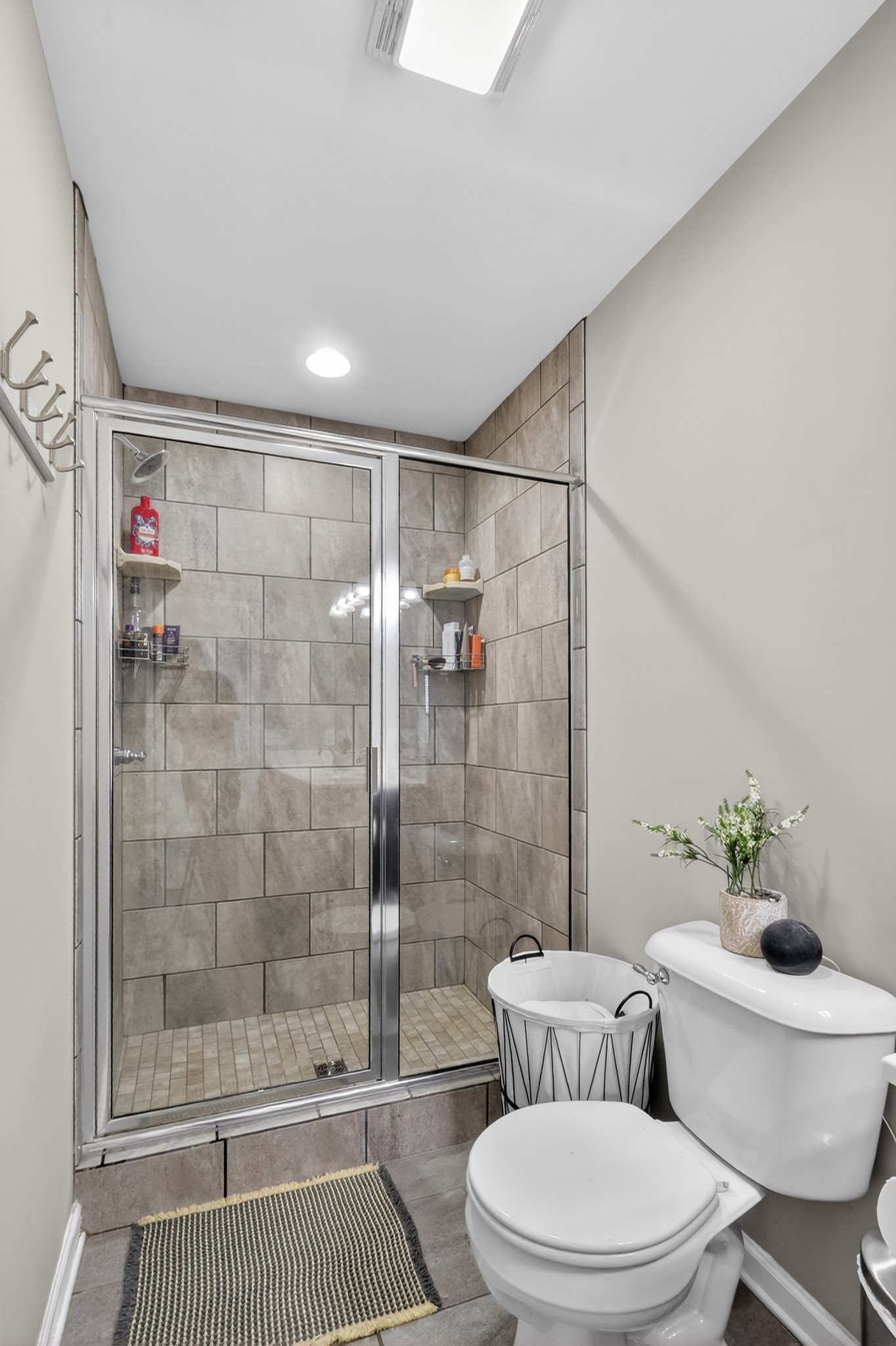 706 Indian Ridge Circle White House, TN 37188 - Photo 25 of 42 a white toilet sitting next to a bathroom