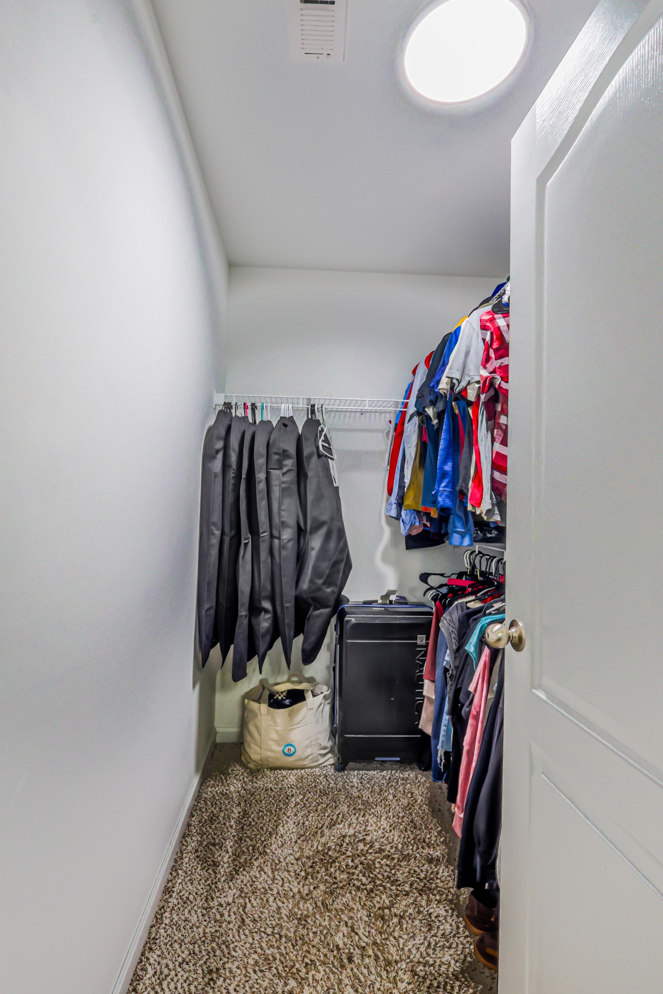 706 Indian Ridge Circle White House, TN 37188 - Photo 26 of 42 a view of walk in closet with clothes and shoes