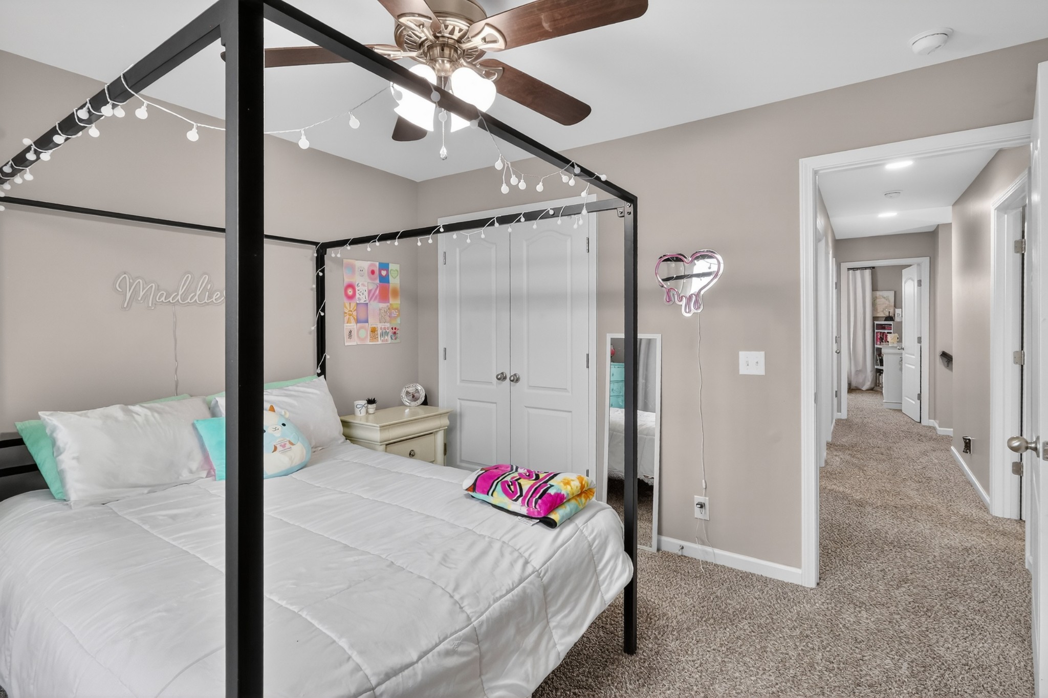 706 Indian Ridge Circle White House, TN 37188 - Photo 28 of 42 a bedroom with a bed and a chandelier