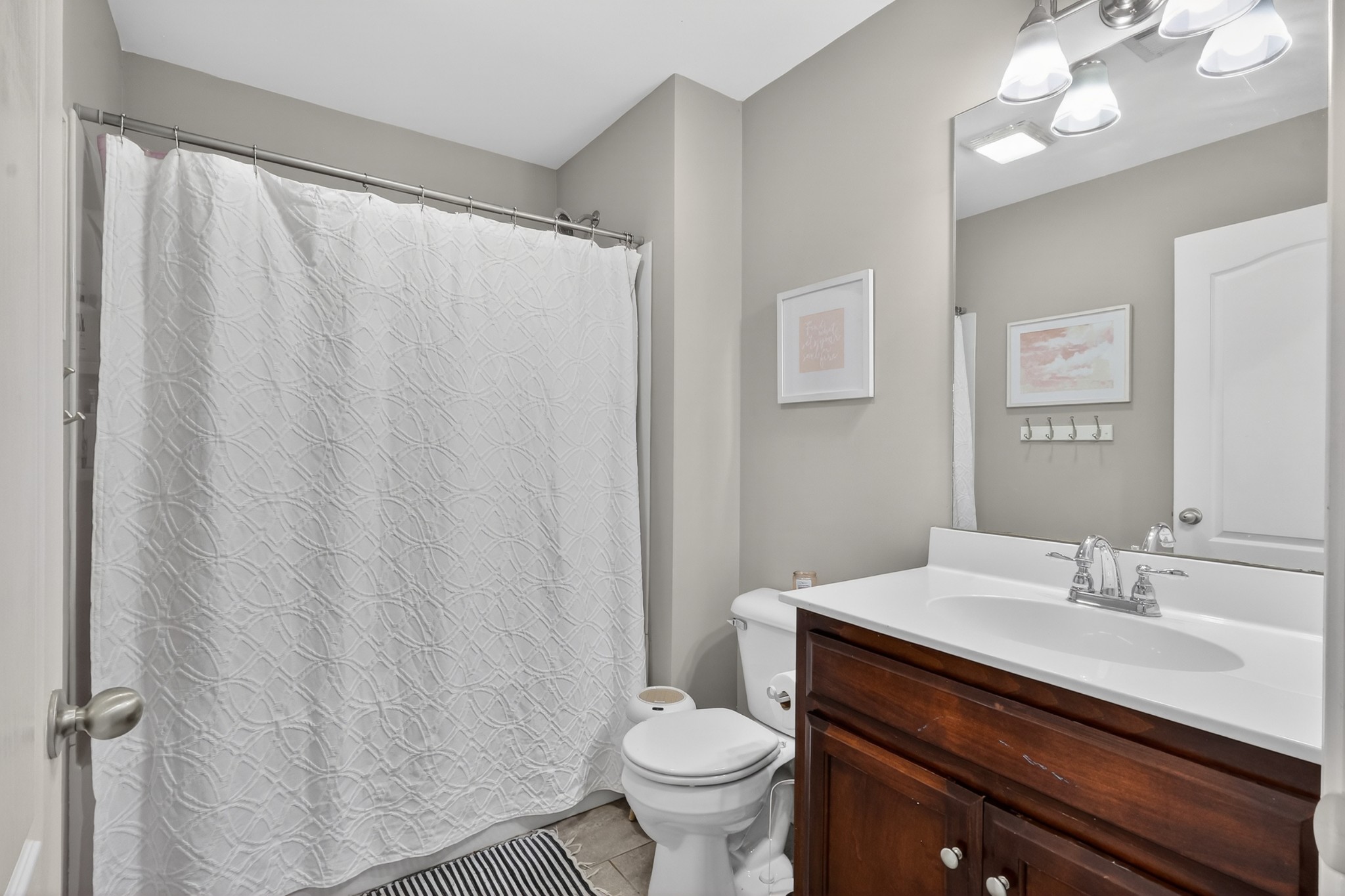 706 Indian Ridge Circle White House, TN 37188 - Photo 32 of 42 a bathroom with a sink toilet and a mirror