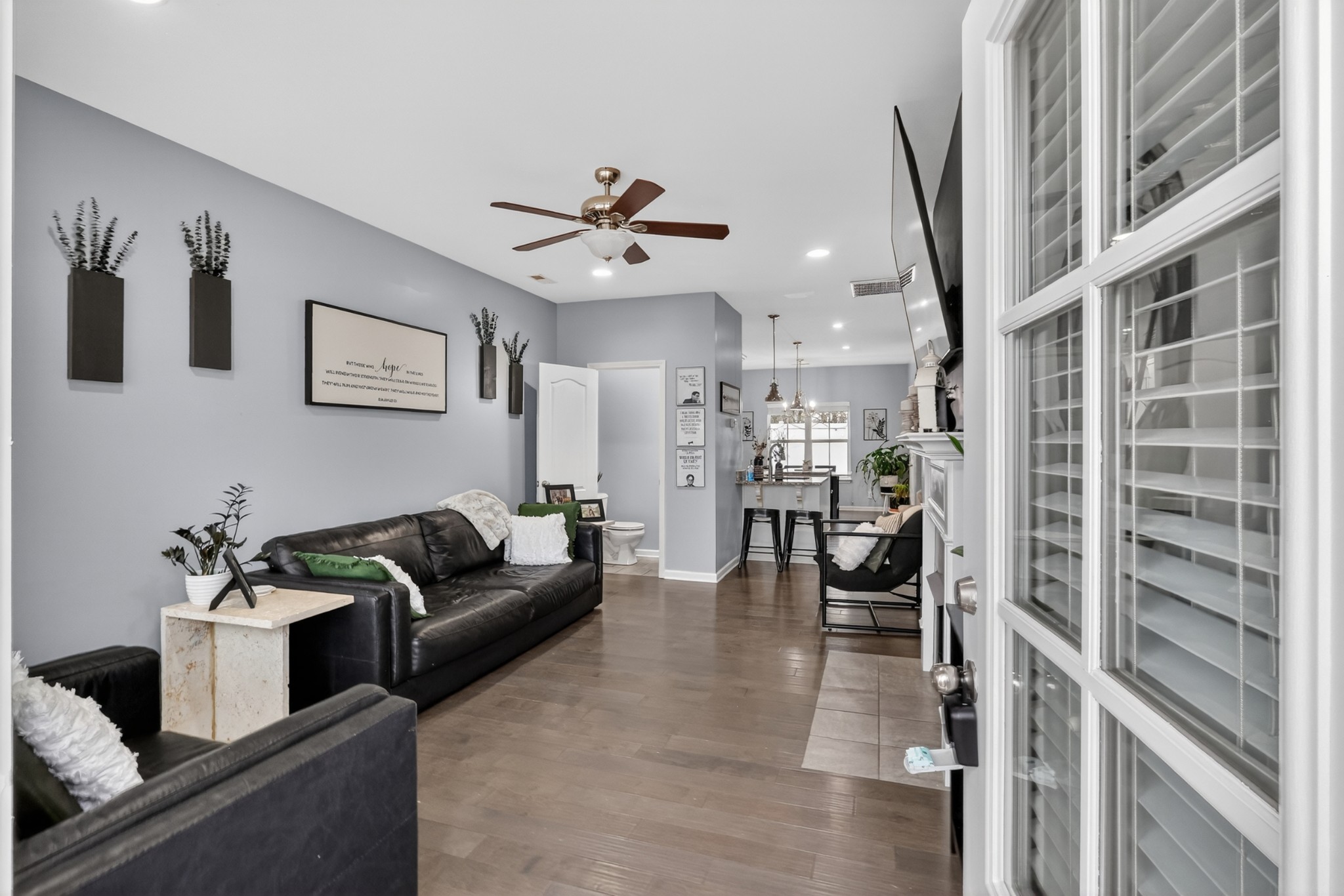706 Indian Ridge Circle White House, TN 37188 - Photo 6 of 42 a living room with furniture and a chandelier
