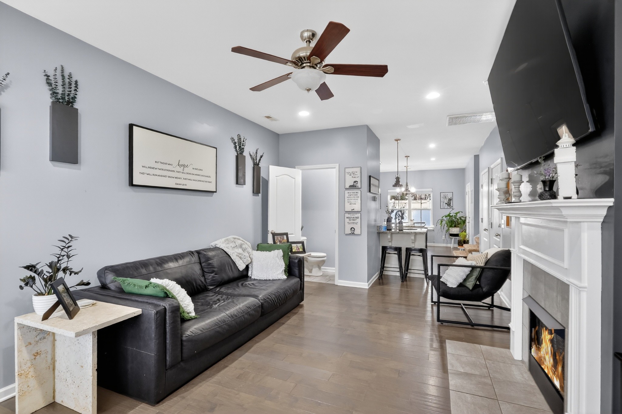 706 Indian Ridge Circle White House, TN 37188 - Photo 7 of 42 a living room with furniture and a fireplace