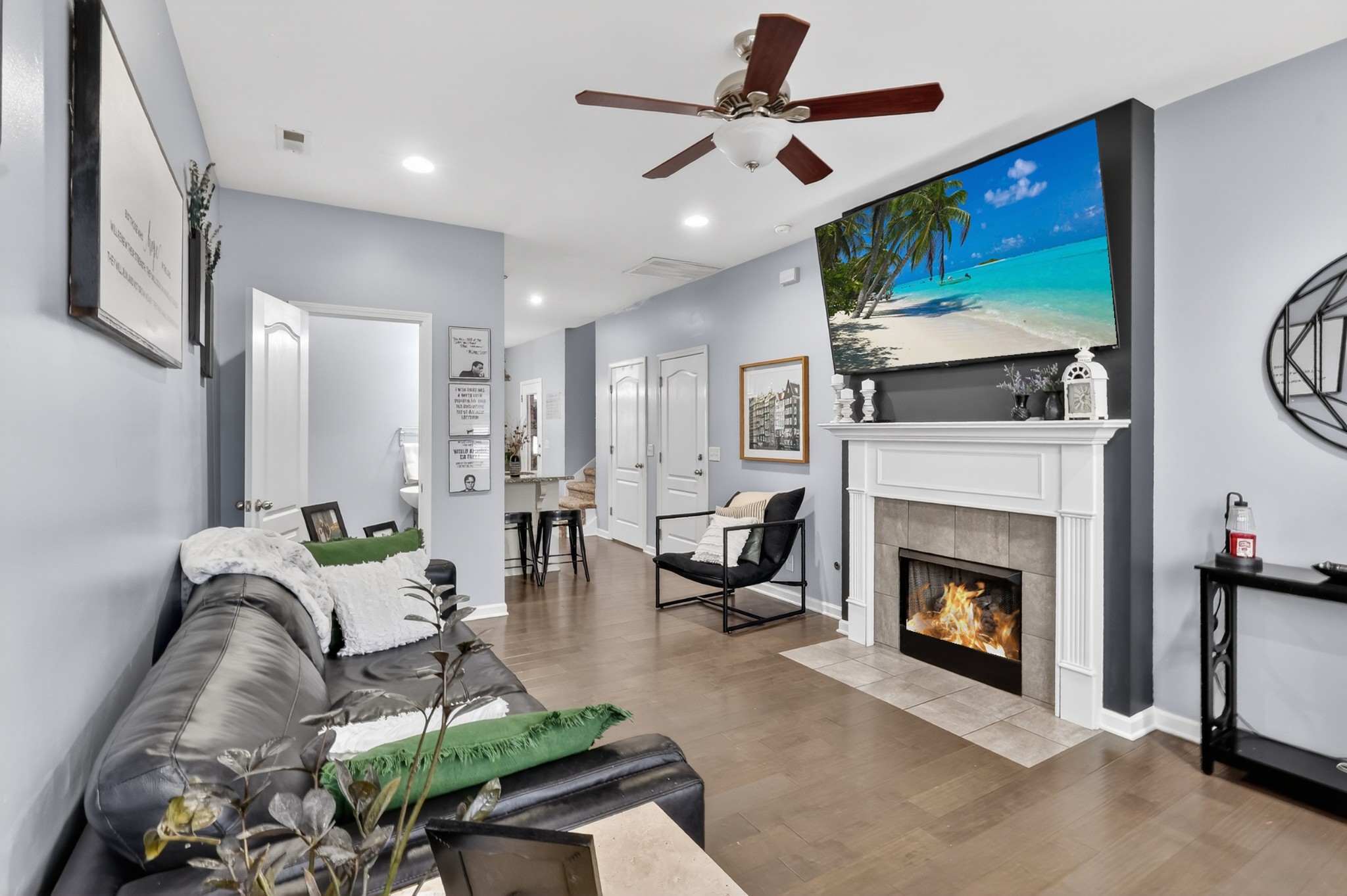 706 Indian Ridge Circle White House, TN 37188 - Photo 8 of 42 a living room with furniture fireplace and a flat screen tv