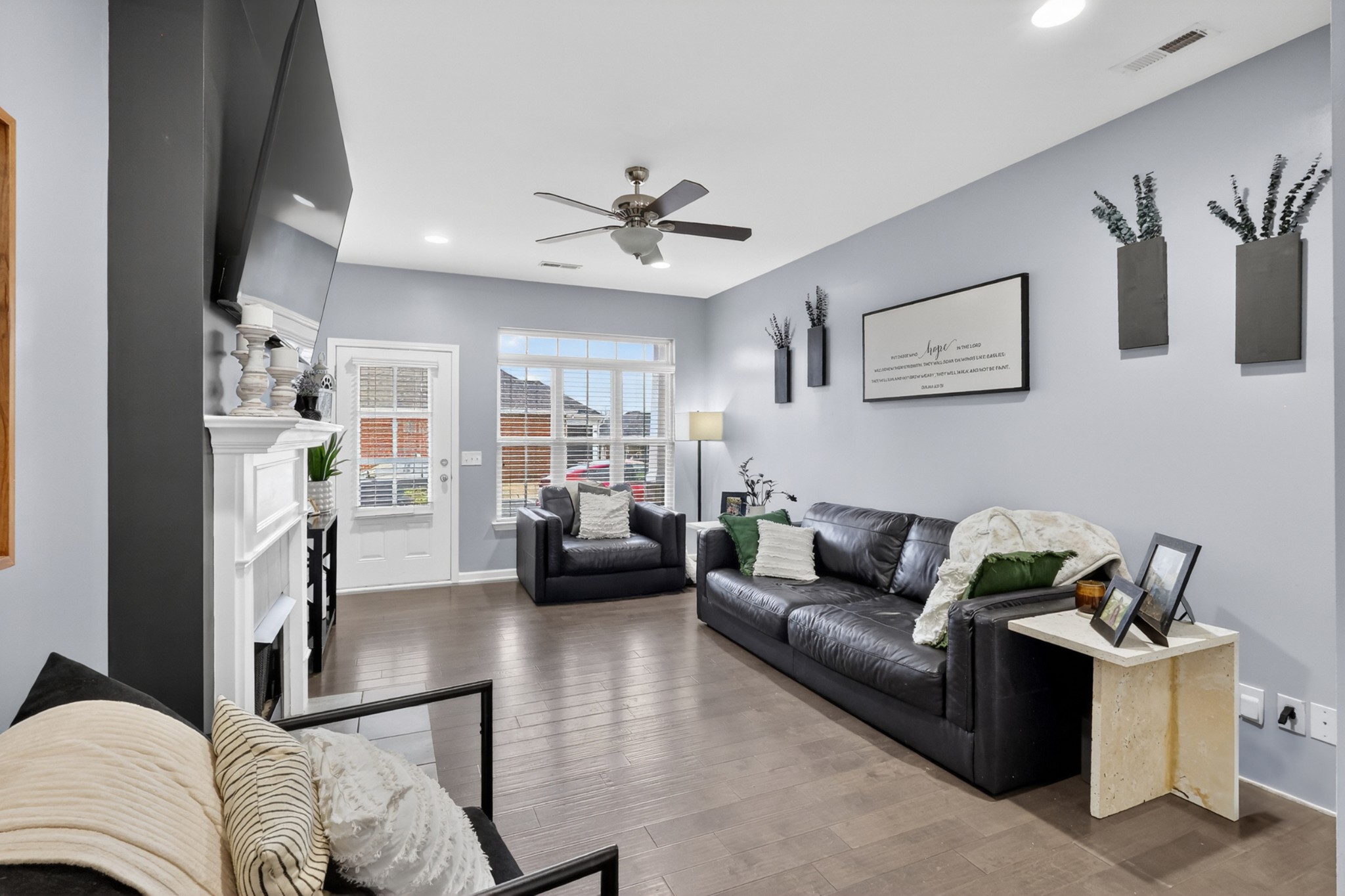 706 Indian Ridge Circle White House, TN 37188 - Photo 10 of 42 a living room with furniture and a chandelier