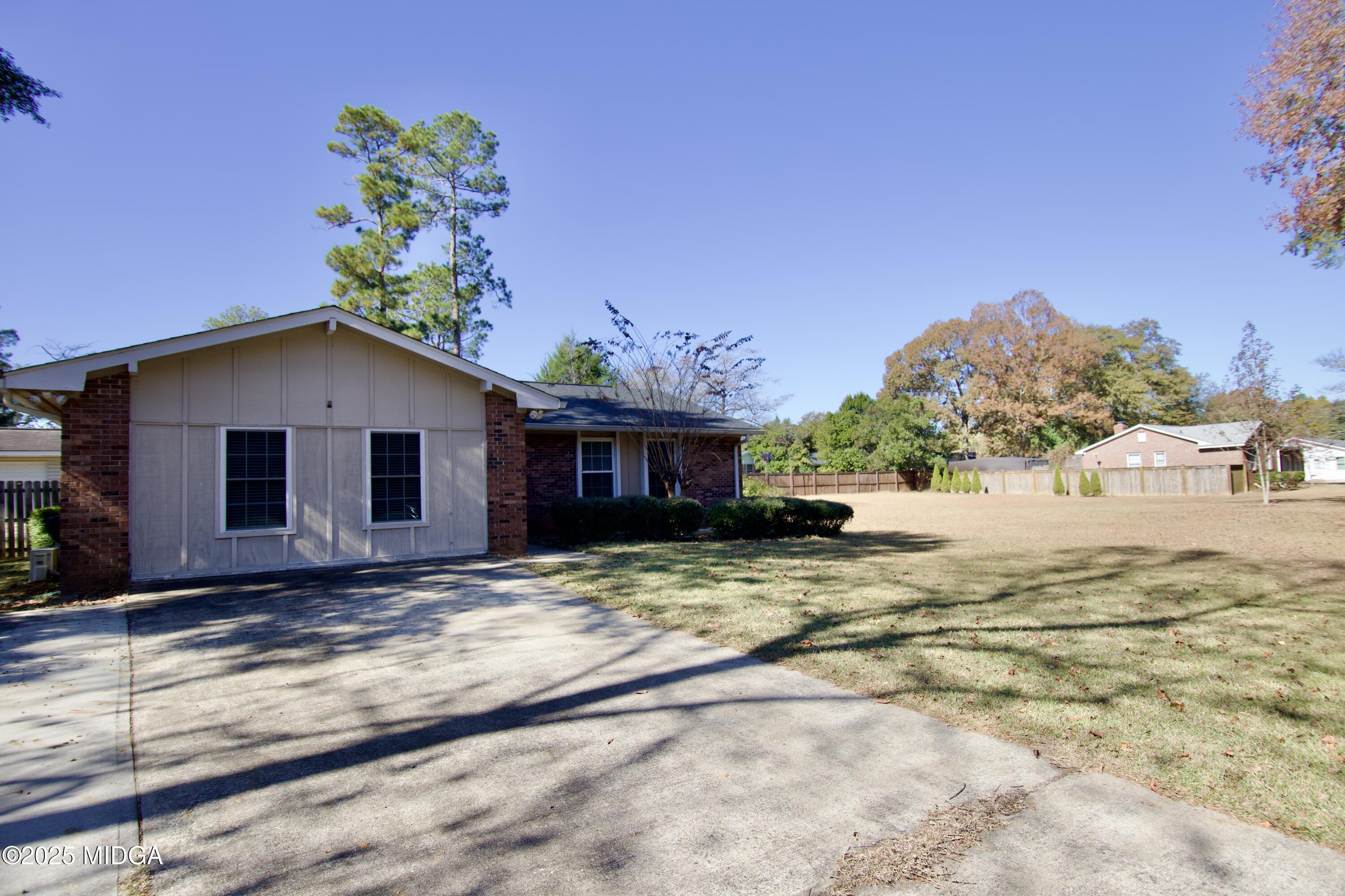 1205 Morningside Drive Perry, GA 31069 - Photo 30 of 31 a view of a house with a yard
