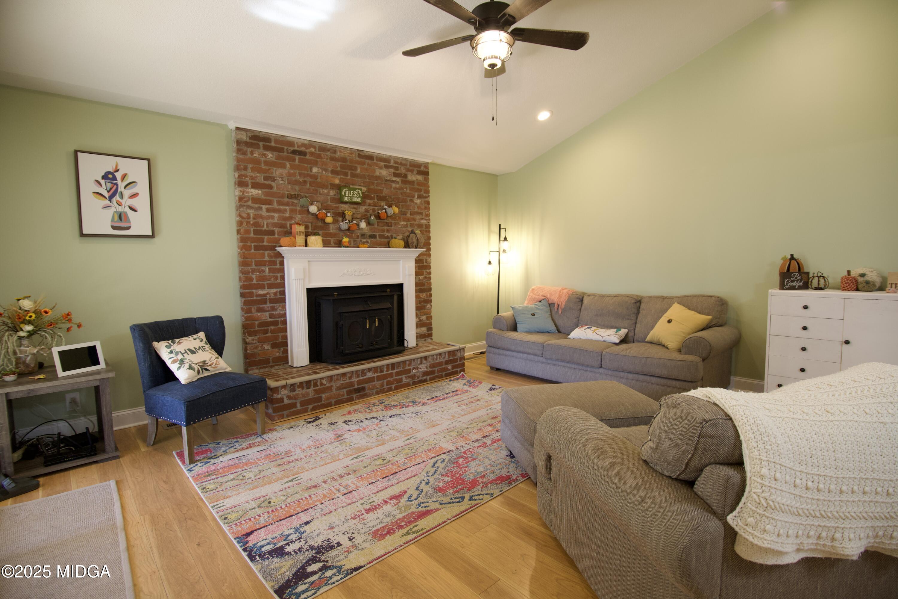 1205 Morningside Drive Perry, GA 31069 - Photo 4 of 31 a living room with furniture and a fireplace
