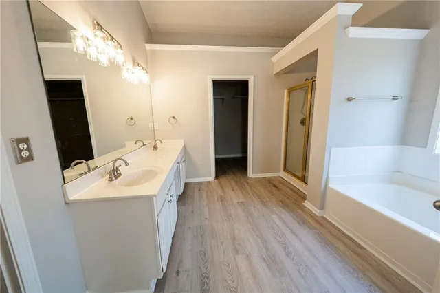 a bathroom with a sink and a large mirror