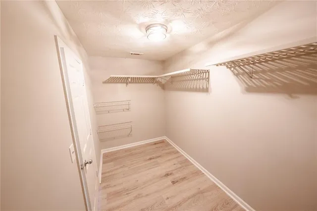 a view of a room with racks on the wall