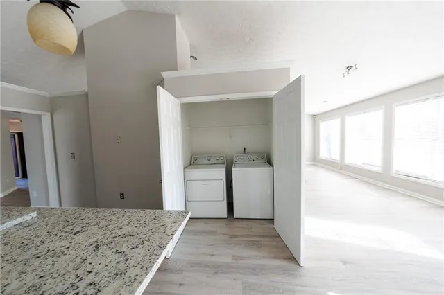 a bedroom with a bed and a sink