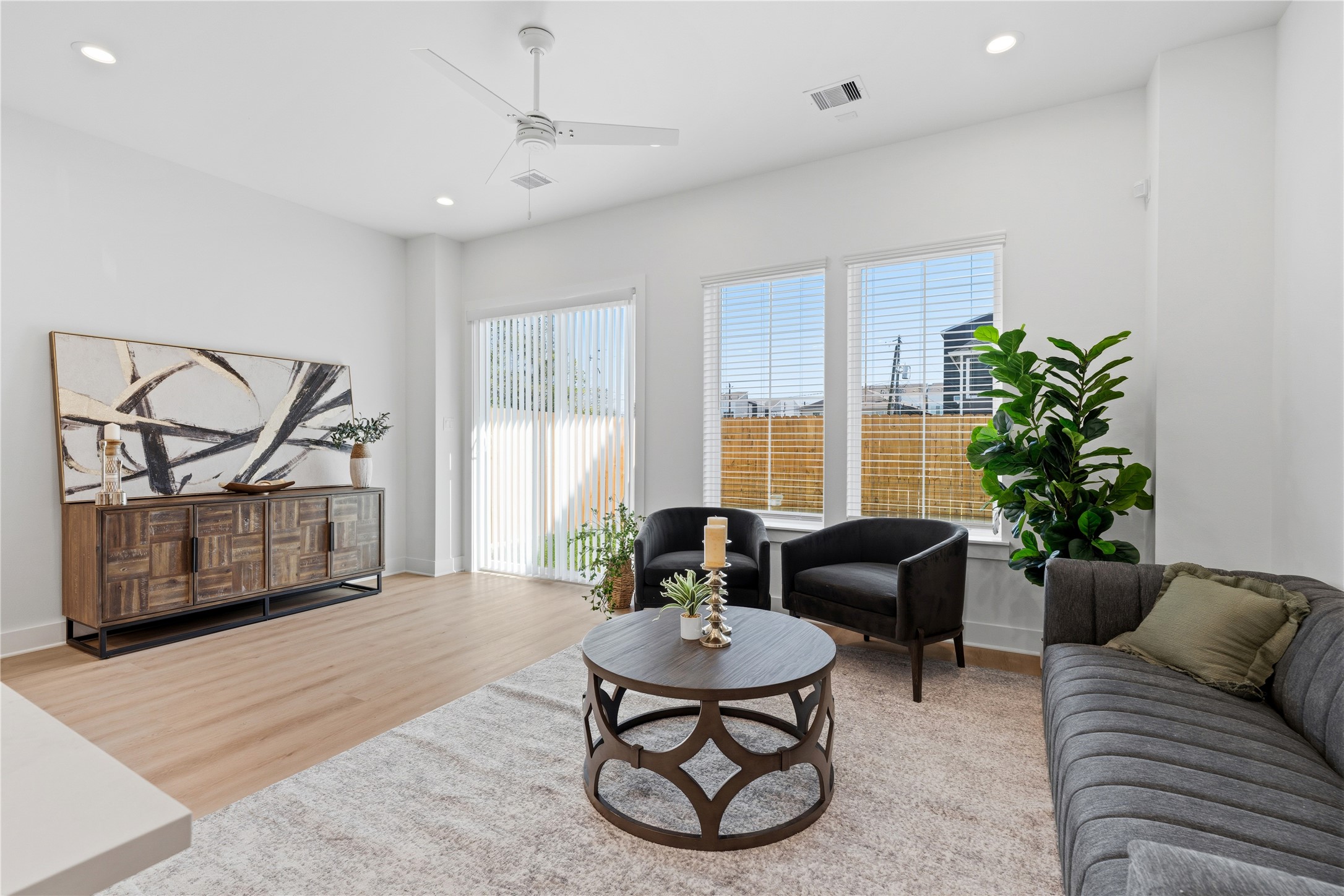4610 Gunter Street Houston, TX 77020 - Photo 43 of 43 a living room with furniture a window and a potted plant