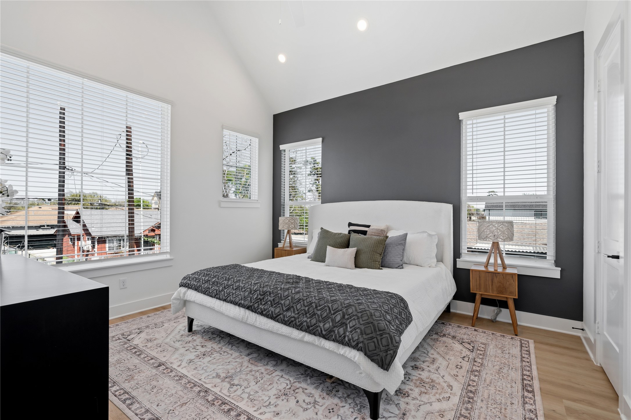 4610 Gunter Street Houston, TX 77020 - Photo 16 of 43 a bedroom with a large bed and a window