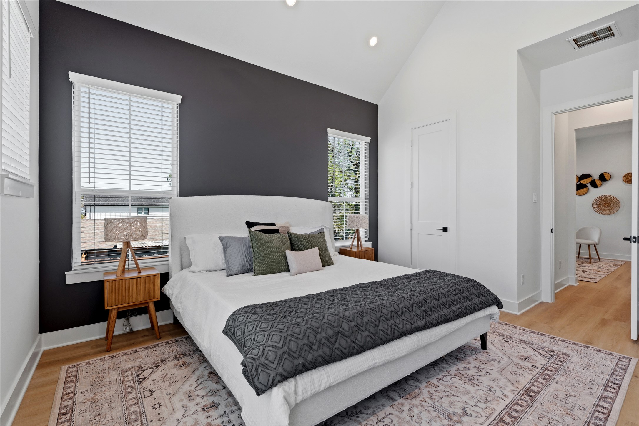 4610 Gunter Street Houston, TX 77020 - Photo 17 of 43 a bedroom with a large bed and a window
