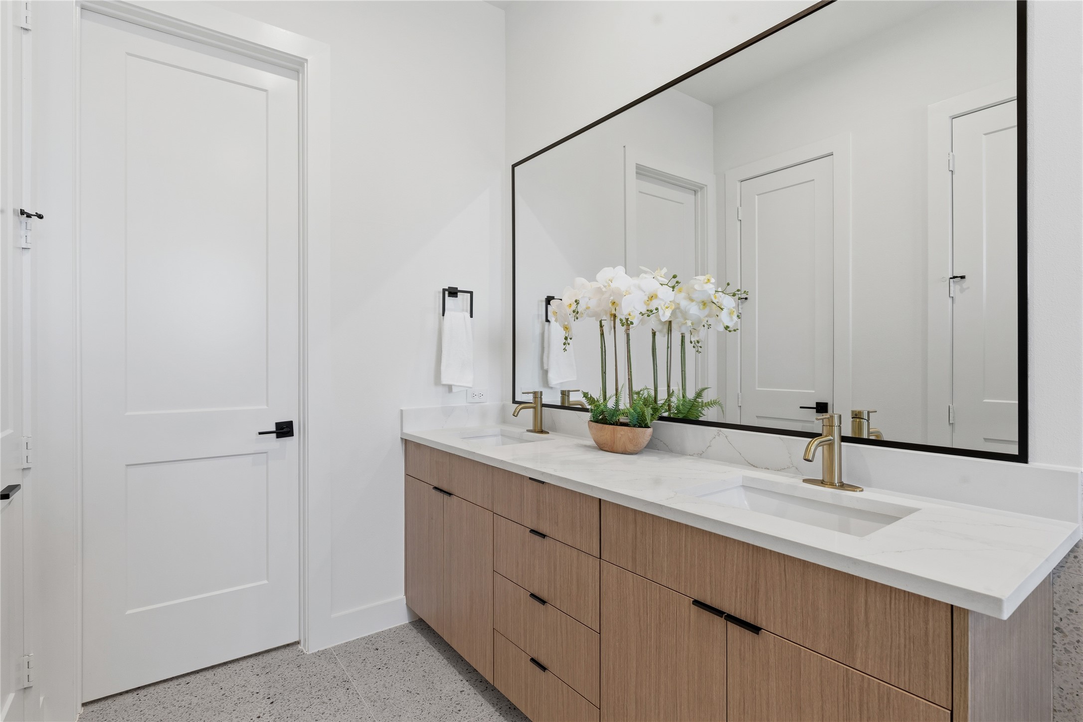 4610 Gunter Street Houston, TX 77020 - Photo 19 of 43 a bathroom with a double vanity sink and a mirror