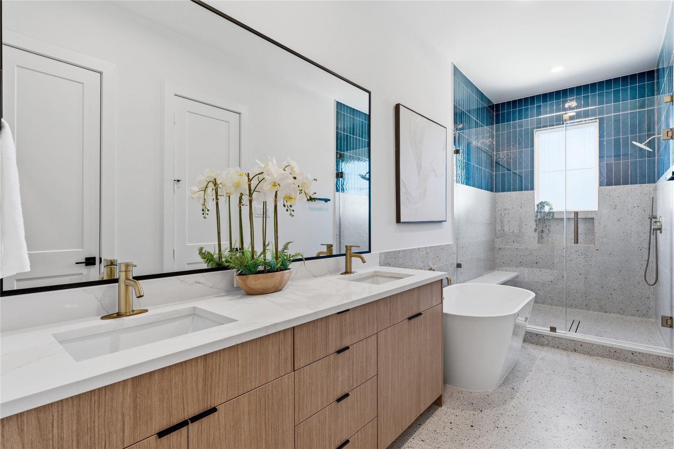 4610 Gunter Street Houston, TX 77020 - Photo 20 of 43 a bathroom with a double vanity sink and a mirror