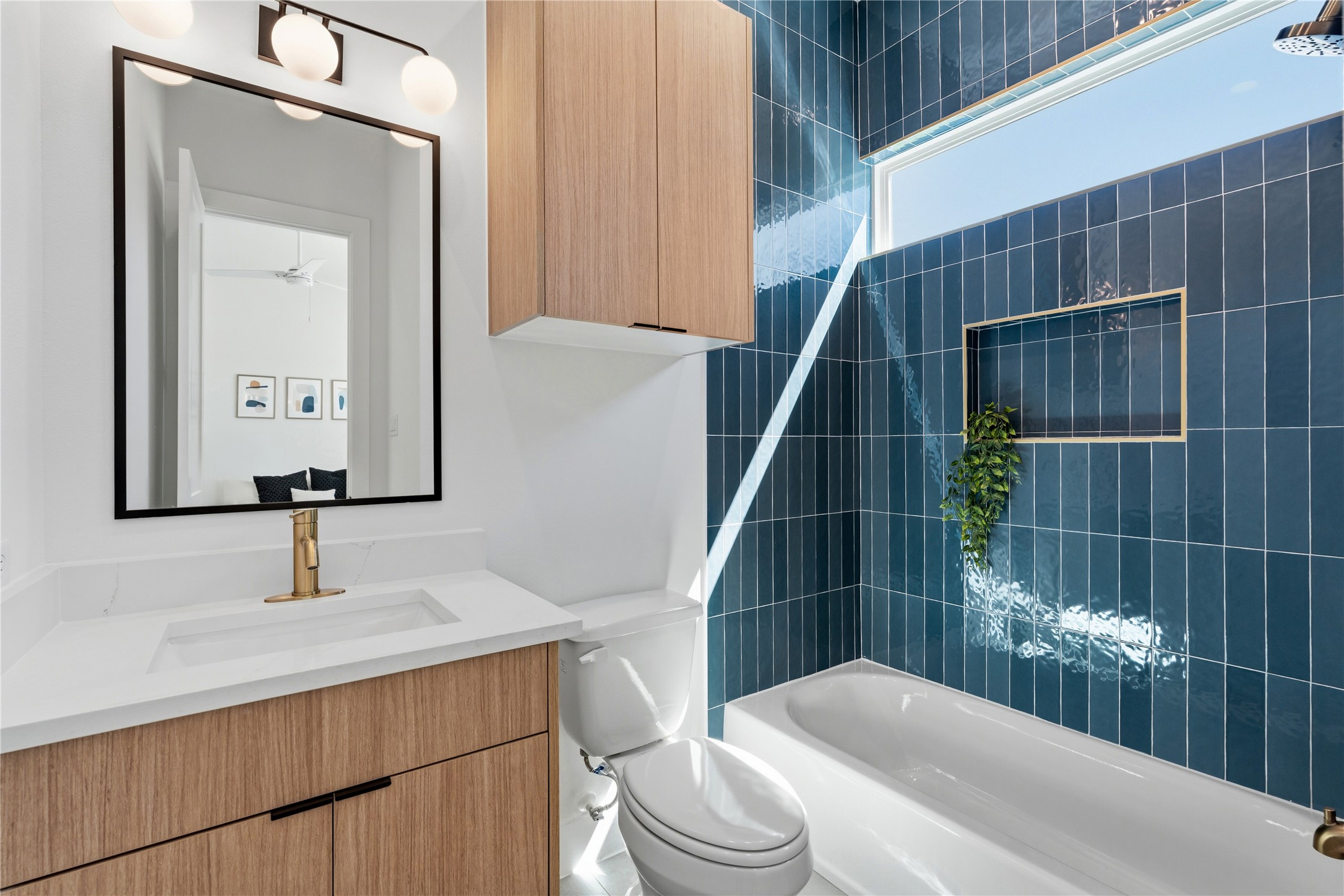 4610 Gunter Street Houston, TX 77020 - Photo 27 of 43 a bathroom with a sink a toilet and shower