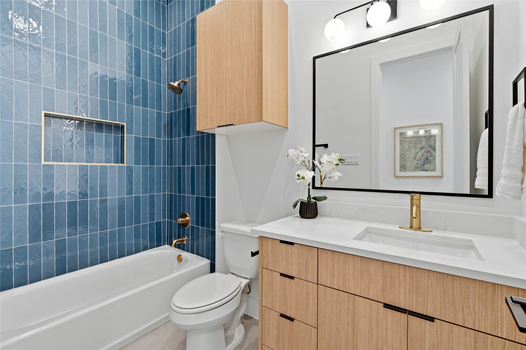 4610 Gunter Street Houston, TX 77020 - Photo 37 of 43 a bathroom with a sink a toilet and shower