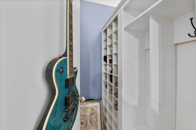 a view of a closet with storage