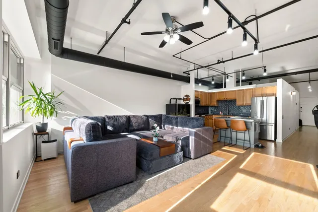 a living room with furniture and a couch