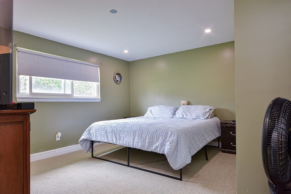35 Worcester Street Methuen, MA 01844 - Photo 17 of 31 a bedroom with a bed and window