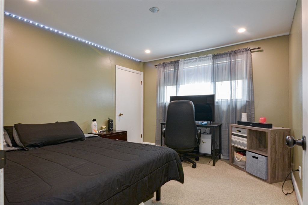 35 Worcester Street Methuen, MA 01844 - Photo 19 of 31 a bedroom with a bed and furniture