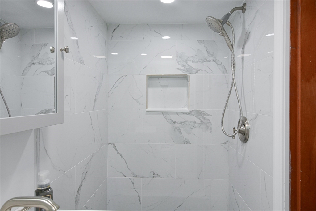 35 Worcester Street Methuen, MA 01844 - Photo 27 of 31 a bathroom with a shower