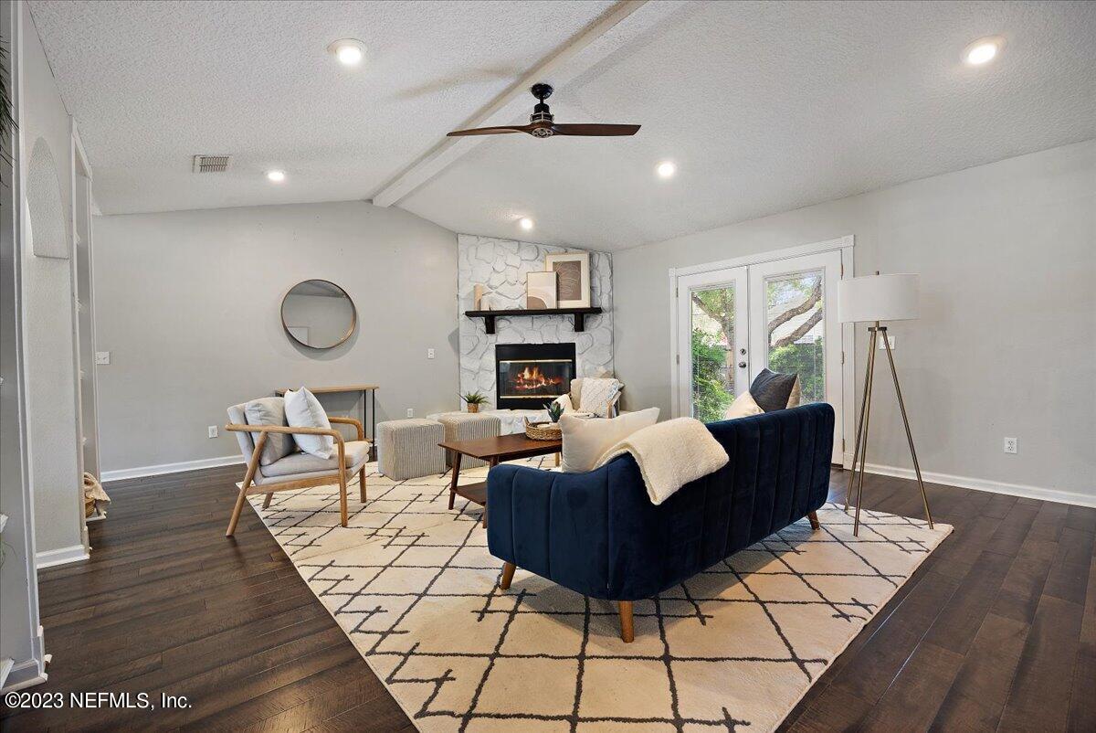 369 Owen Acres Drive Macclenny, FL 32063 - Photo 9 of 21 a living room with fireplace furniture and a wooden floor