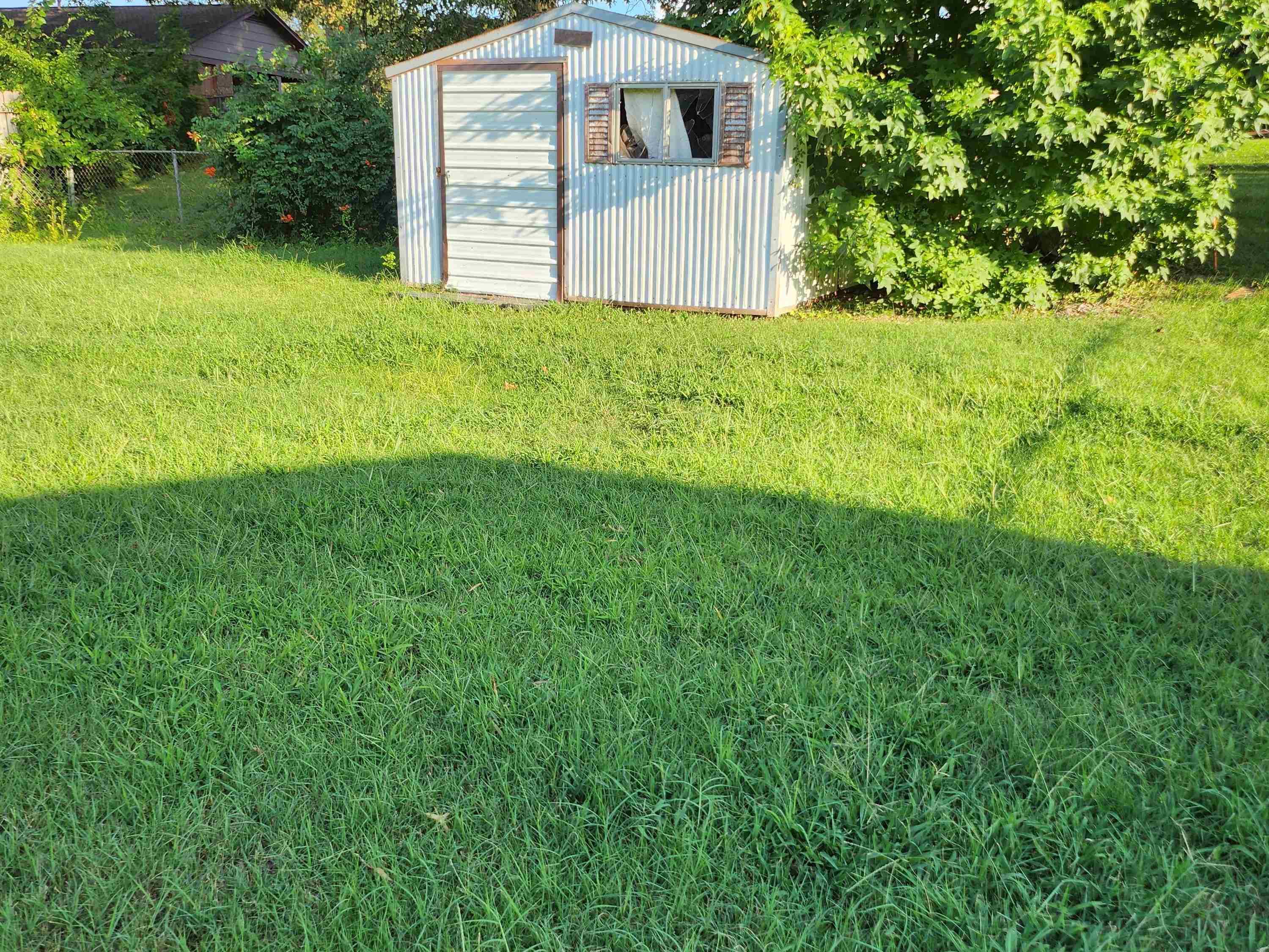 171 Loraine Road Memphis, TN 38109 - Photo 12 of 12 a view of a house with a yard
