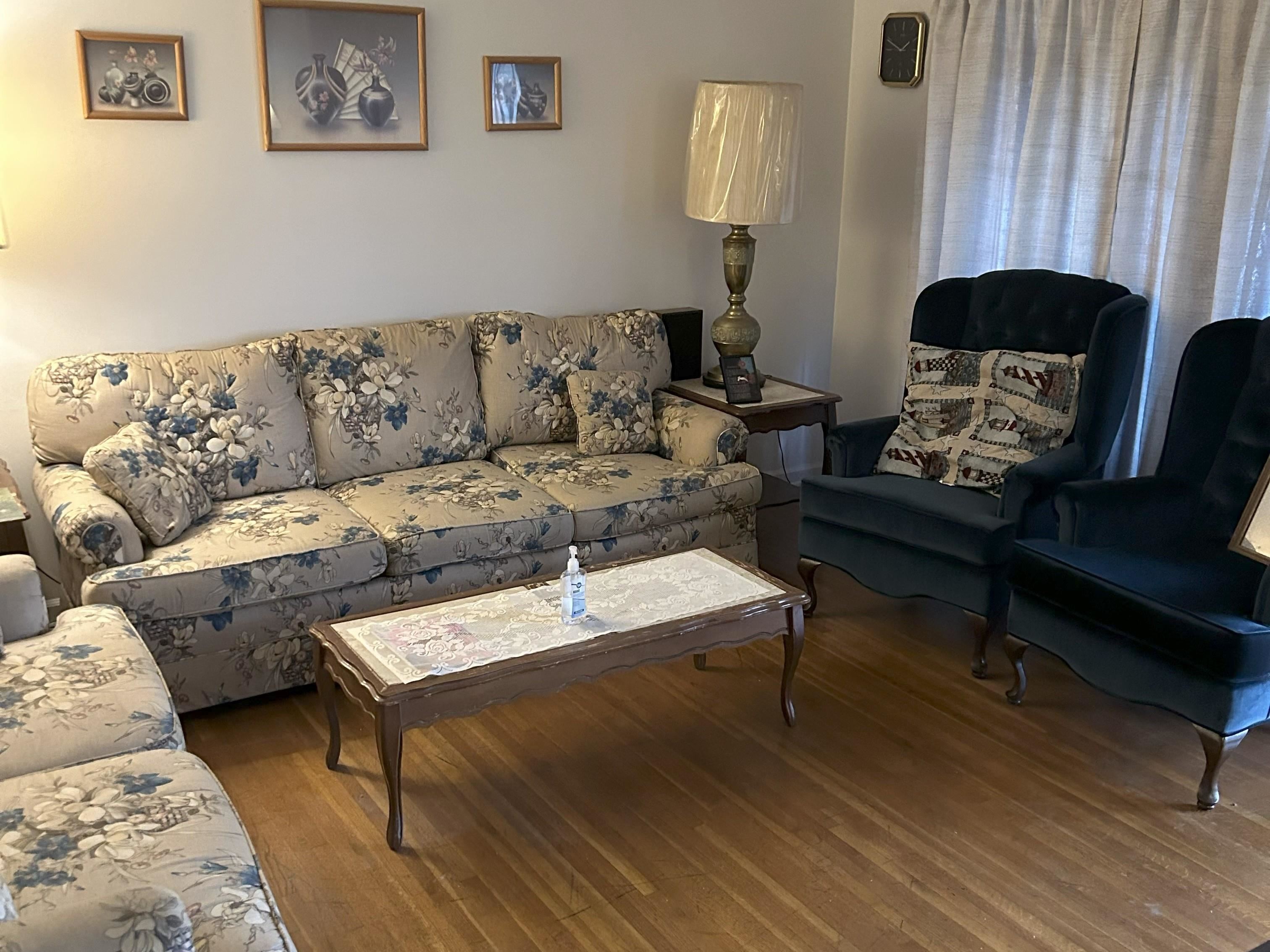 171 Loraine Road Memphis, TN 38109 - Photo 4 of 12 a living room with furniture and a window