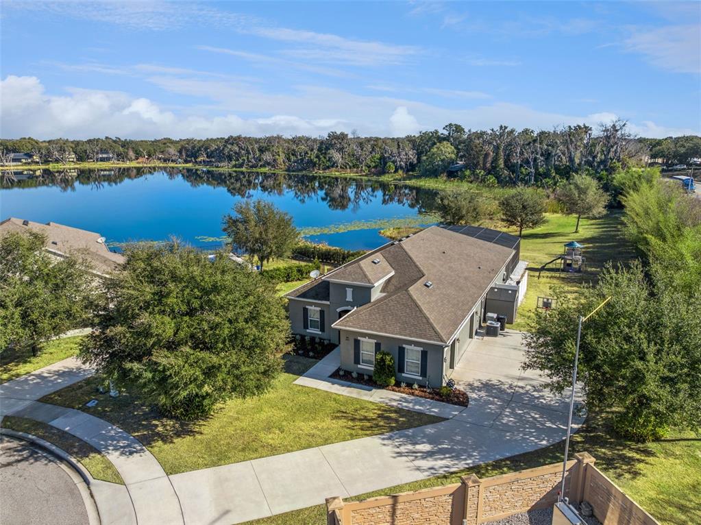 2400 Artist Point Court Apopka, FL 32703 - Photo 39 of 50 an aerial view of a house with a lake view