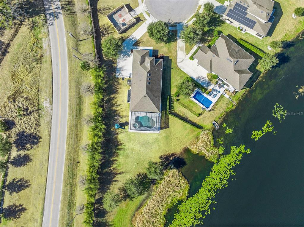 2400 Artist Point Court Apopka, FL 32703 - Photo 47 of 50 an aerial view of a house with a yard swimming pool and outdoor seating