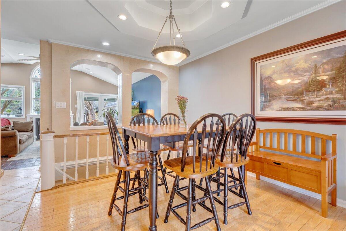 548 Holiday Road Vinton, VA 24179 - Photo 8 of 56 a view of a dining room with furniture wooden floor and a chandelier