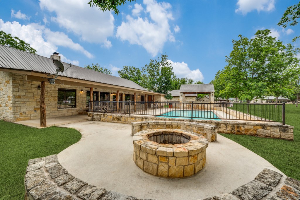 170 Johhny Seibert Lane Rio Frio, TX 78879 - Photo 26 of 67 a front view of a house with swimming pool having outdoor seating